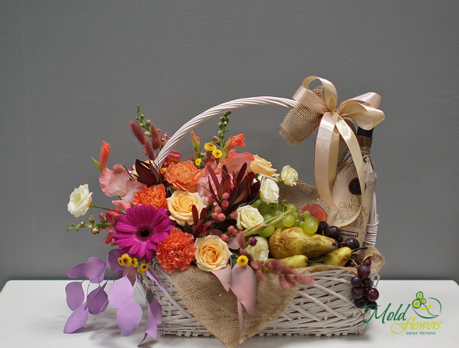 Basket with Roses, Gladioli, Carnations, Fruits, and Wine photo